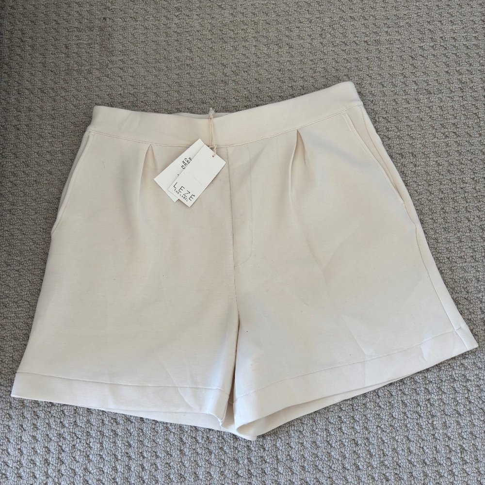 Leze The Label High-Waist Pleat Front Shorts in Off-White/Cream